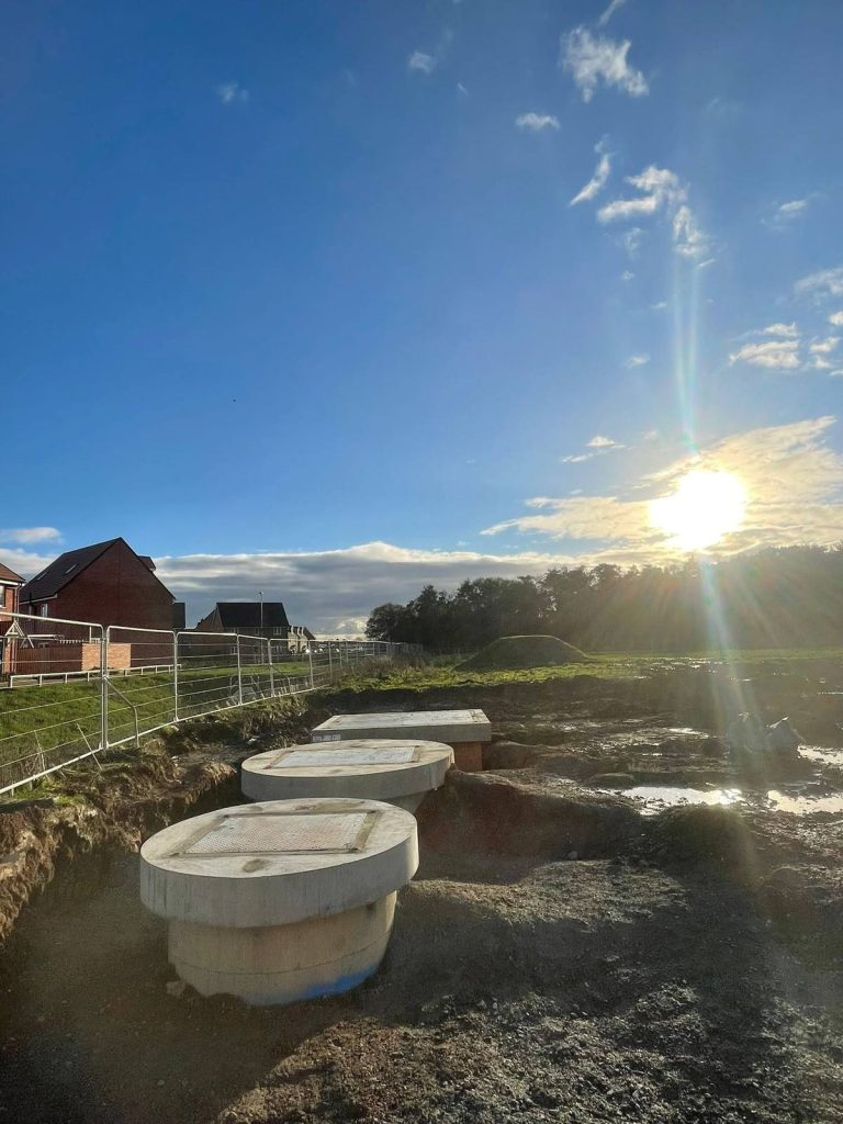 Precast concrete pump station chambers on a housing development site